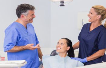 dentist with patient